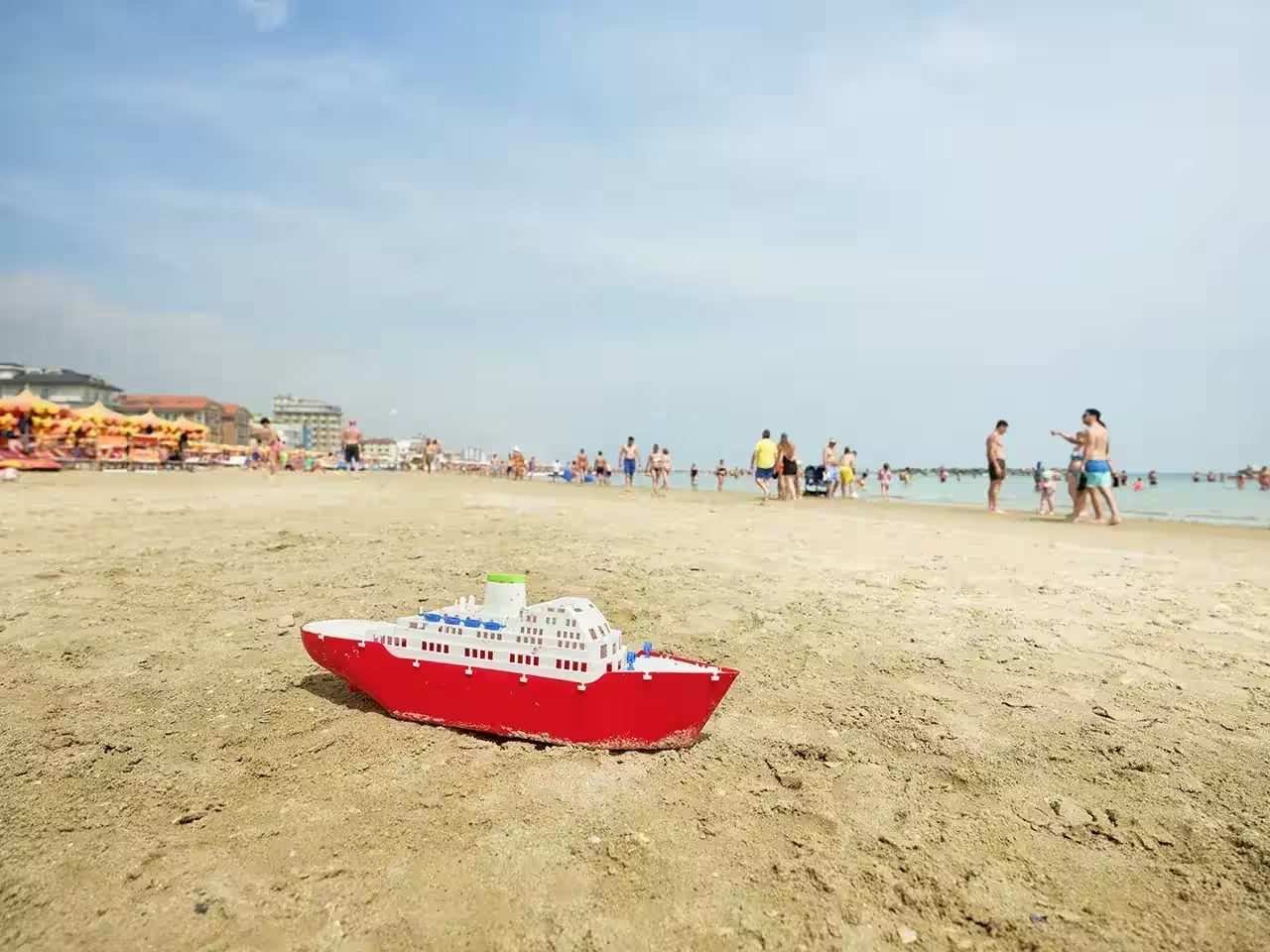 Caribbean cruise ship docked near a tropical beach