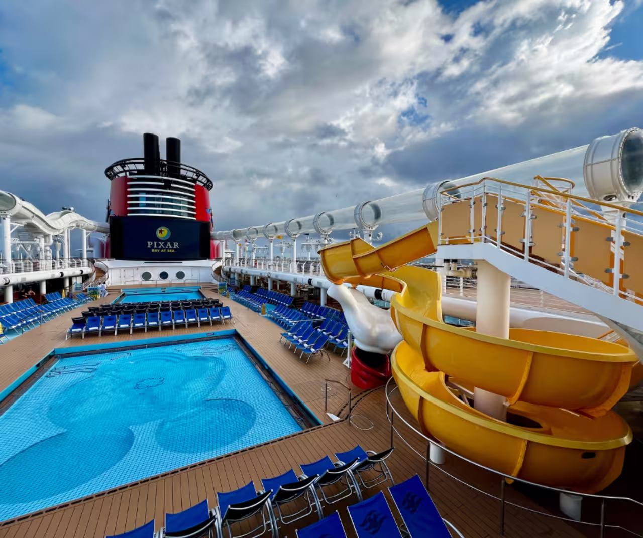 Disney Cruise Line ship at a tropical port